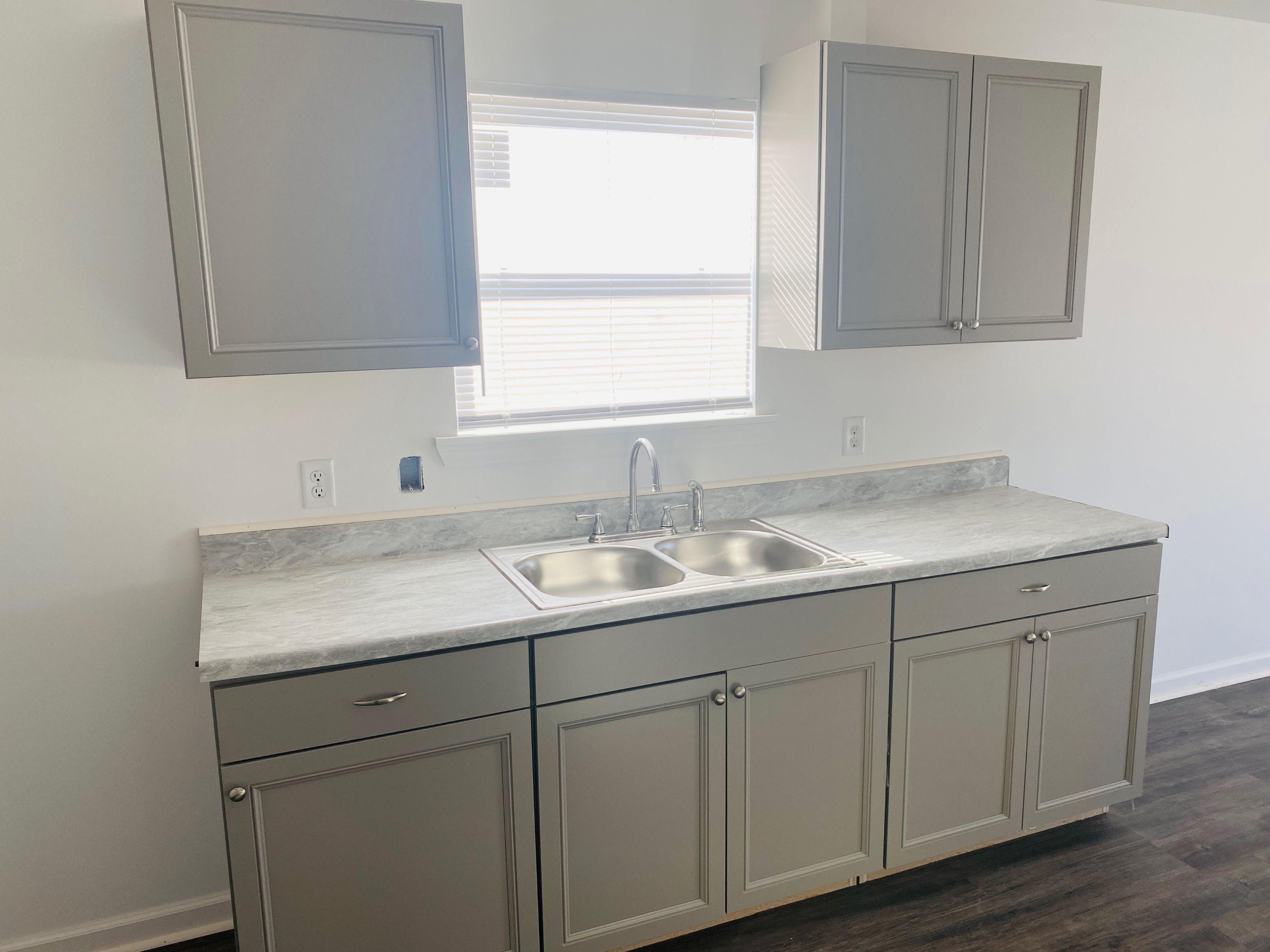 Unit 1 photo 2 — representative property photo; virtually staged or AI-enhanced representation